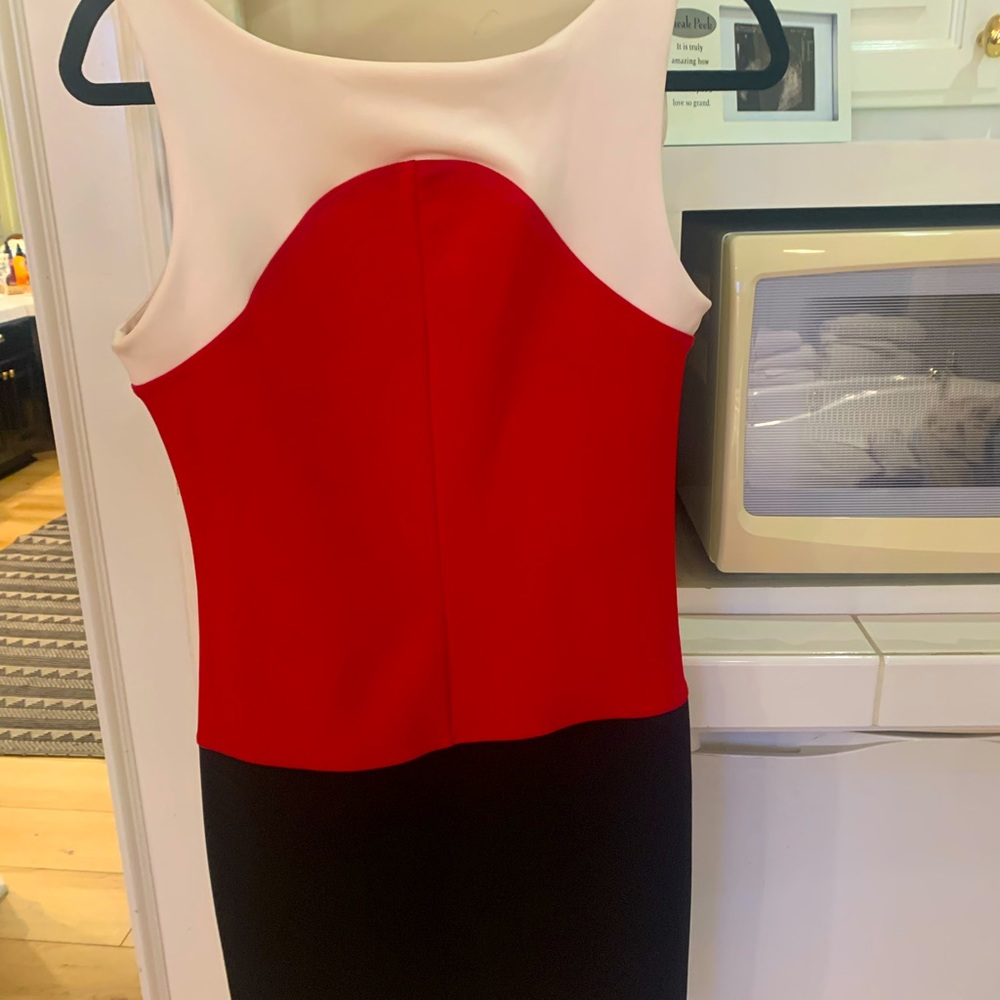 Red black & crème colored sleeveless dress. Very comfortable!